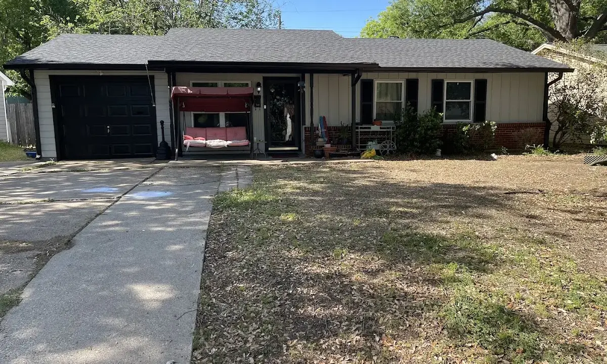 Asphalt Shingle Roof Repair crew at work on a residential roof in Jonesboro